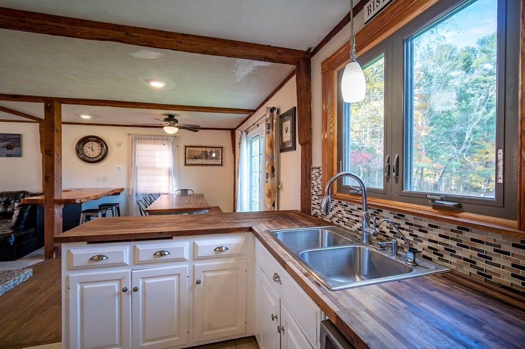 151 Fuller Street Middleboro, MA 02346 - Photo 5 of 24 a kitchen with a sink and a large window