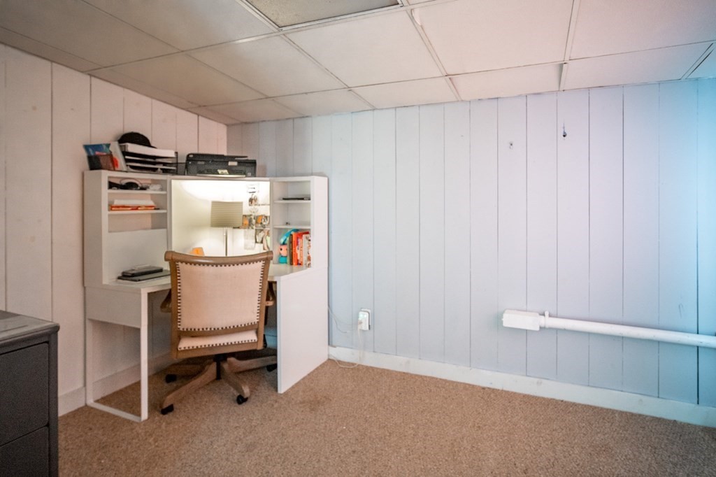 151 Fuller Street Middleboro, MA 02346 - Photo 7 of 24 a room with a chair and white appliances