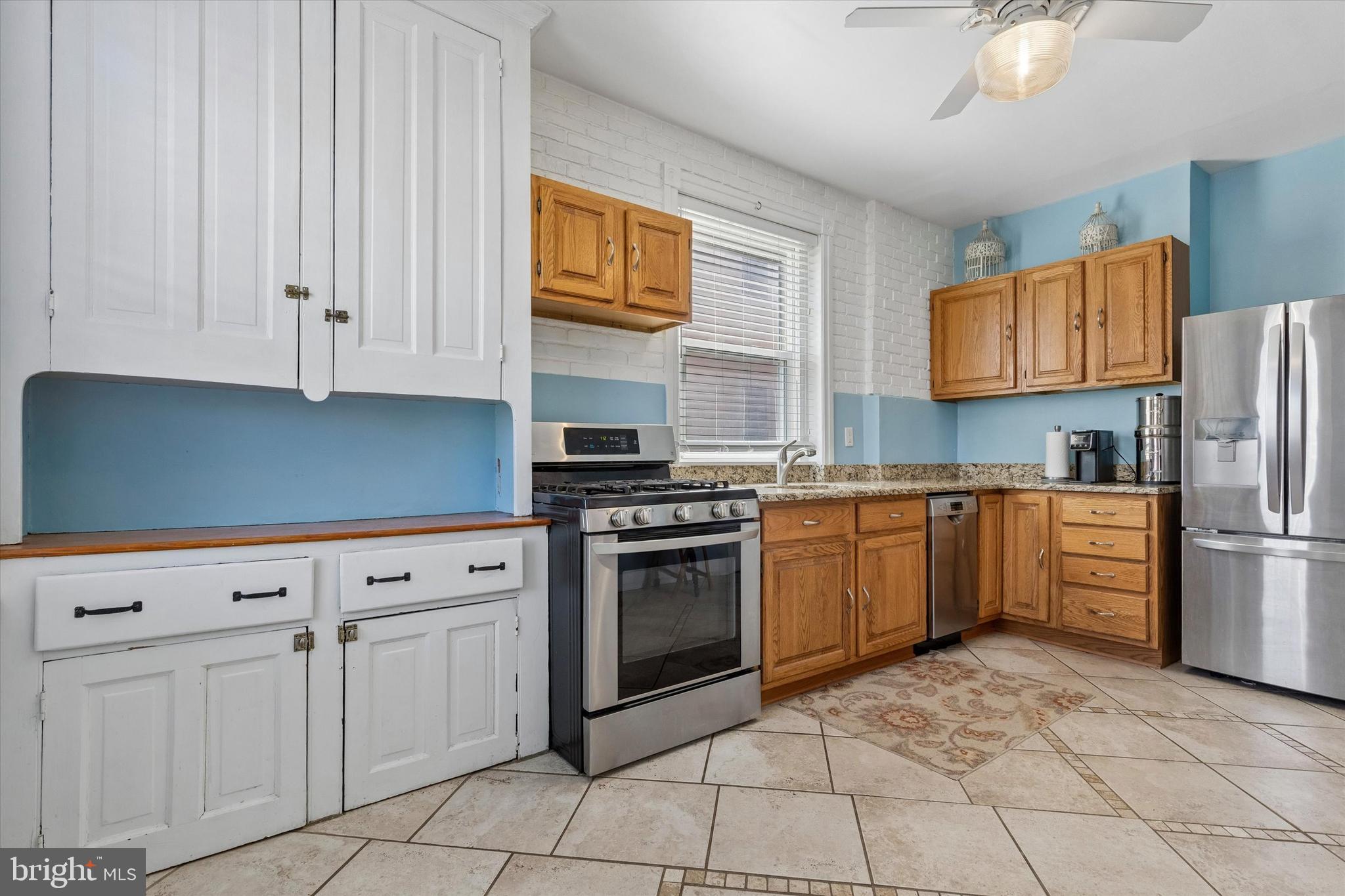 35 North Ridge Avenue Ambler, PA 19002 - Photo 9 of 15 a kitchen with cabinets and stainless steel appliances