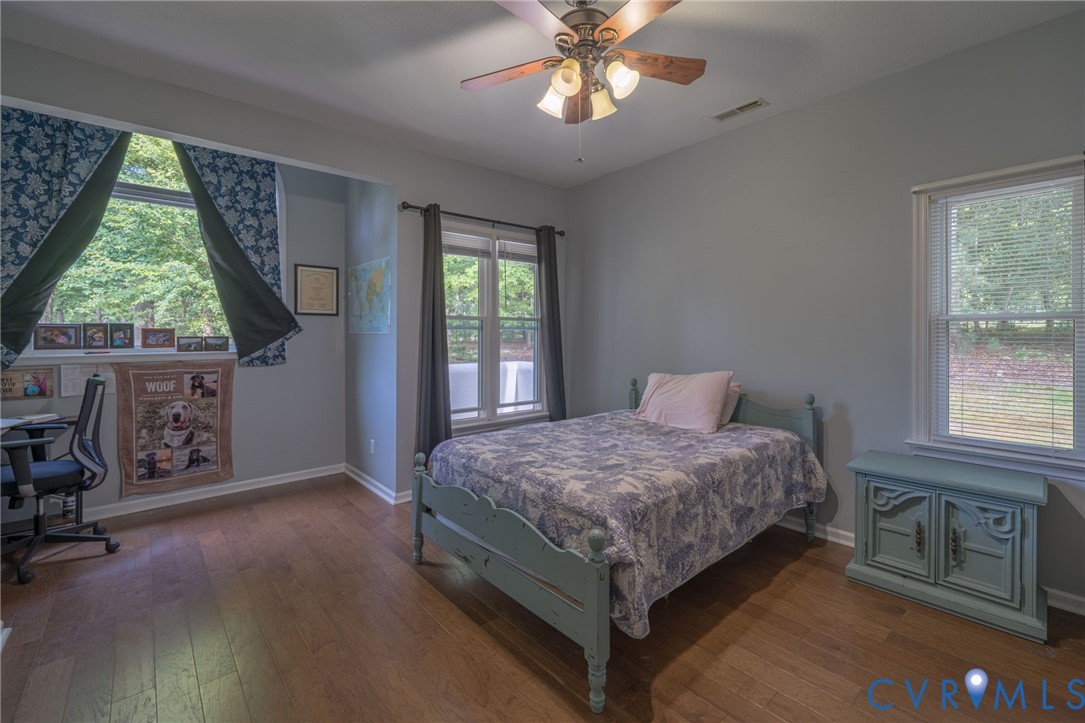 12700 Coalboro Road Chesterfield, VA 23838 - Photo 30 of 50 Bedroom featuring wood-finish flooring, light grey