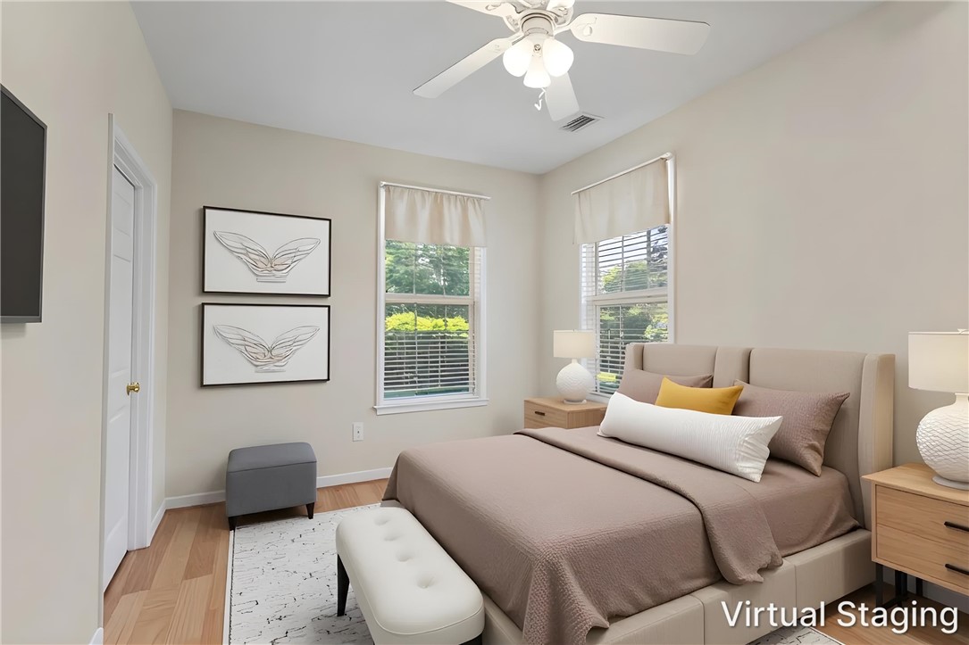 155 Life Style Lane Anderson, SC 29621 - Photo 3 of 49 A tranquil sleeping space awaits, featuring natural light and practical comforts.