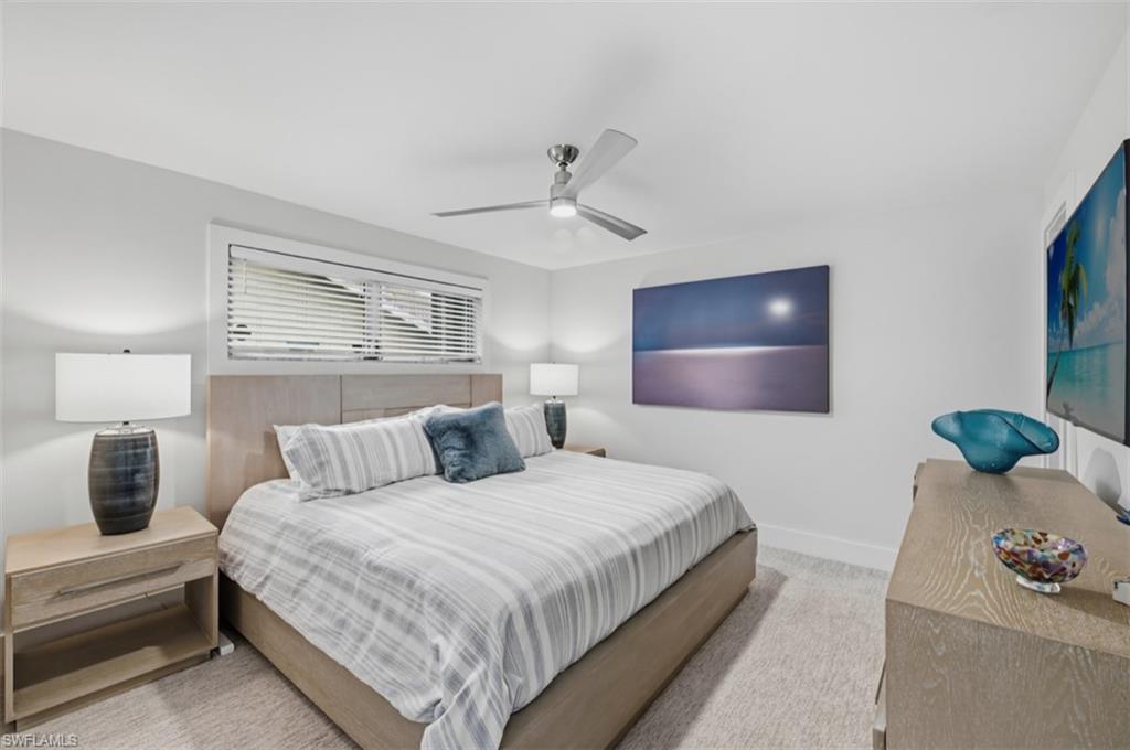 512 Turtle Hatch Road Naples, FL 34103 - Photo 13 of 18 Guest Bedroom accented by a King bed