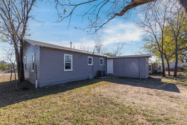 a view of a backyard of a house