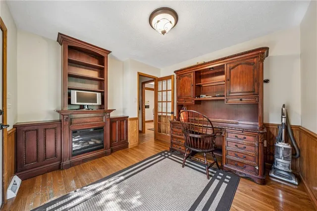 a room with furniture and a fireplace