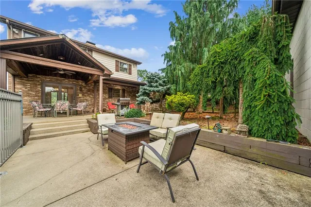 a view of swimming pool outdoor seating