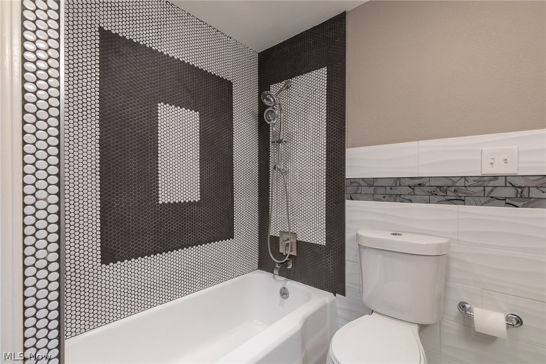 3674 Stoneleigh Road Cleveland, OH 44121 - Photo 25 of 35 More custom wall tile in the Main Bathroom