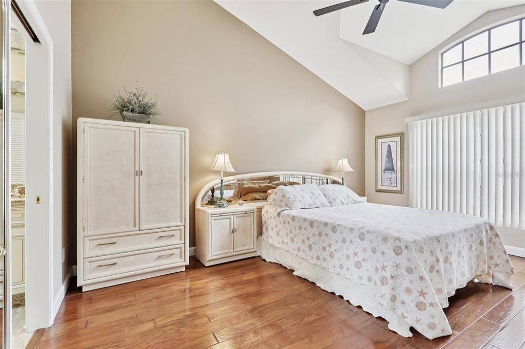 116 Baytree Boulevard Tavares, FL 32778 - Photo 16 of 47 a bed room with a bed and a window