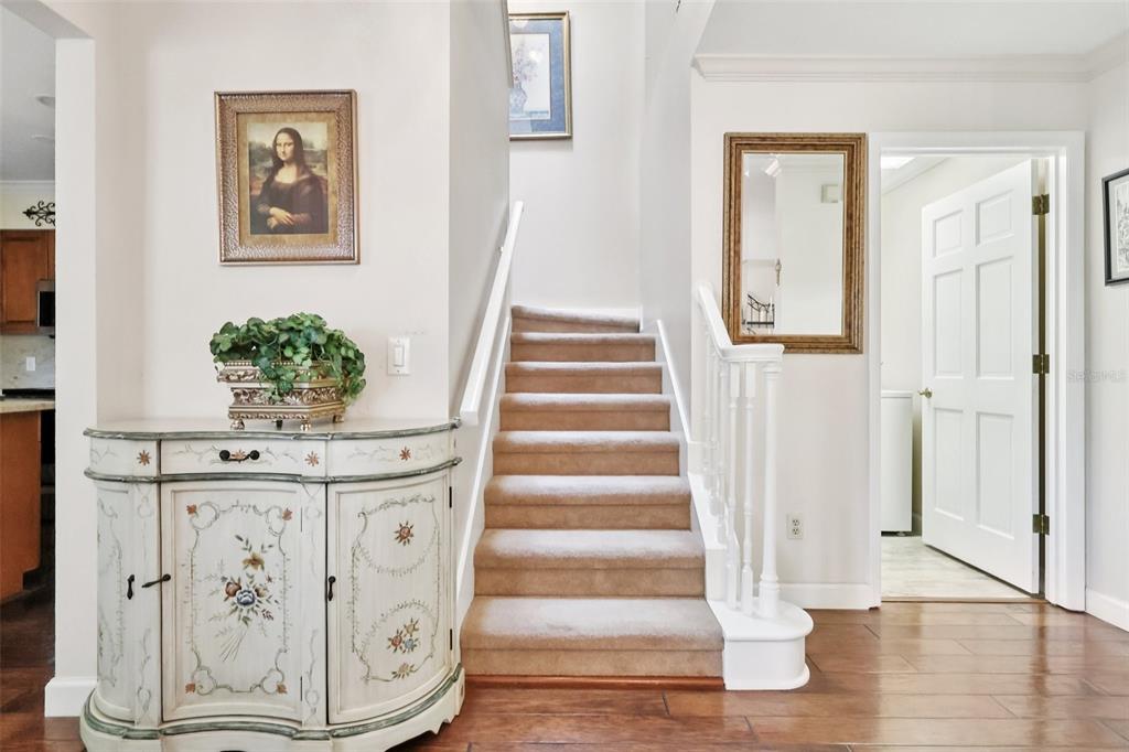 116 Baytree Boulevard Tavares, FL 32778 - Photo 19 of 47 a view of entryway with wooden floor