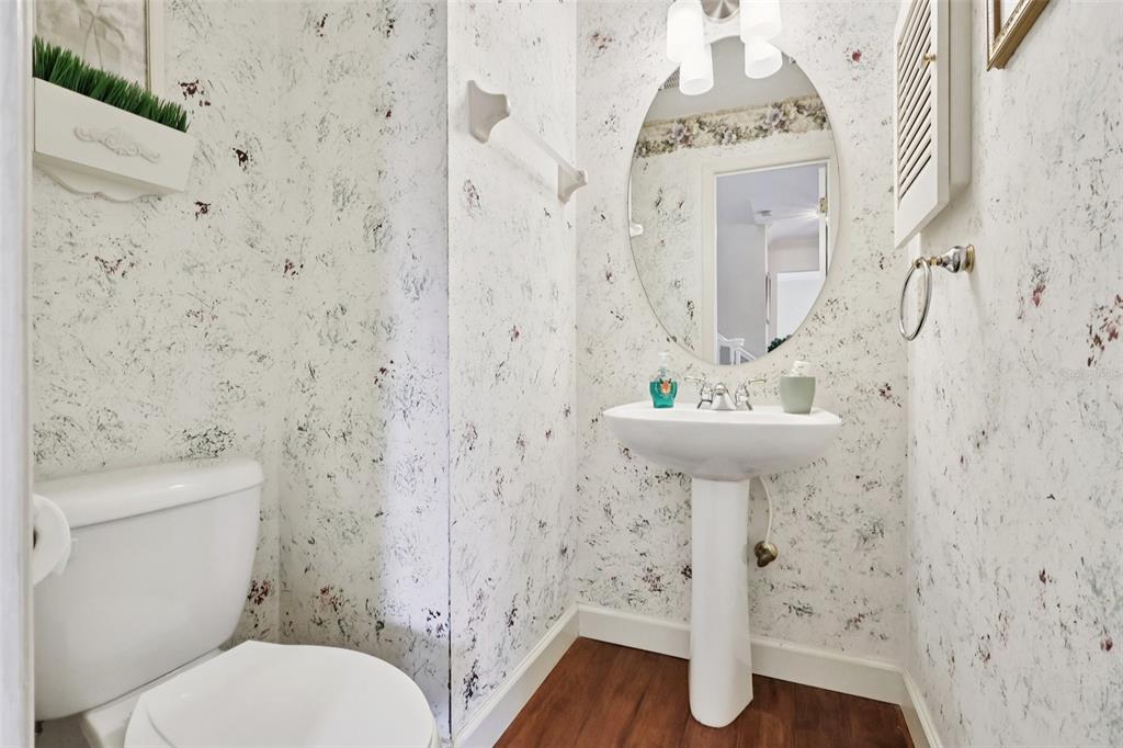 116 Baytree Boulevard Tavares, FL 32778 - Photo 20 of 47 a bathroom with a sink a toilet and shower