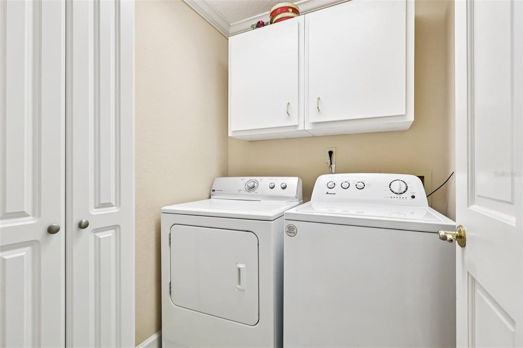 116 Baytree Boulevard Tavares, FL 32778 - Photo 25 of 47 a utility room with dryer and washer