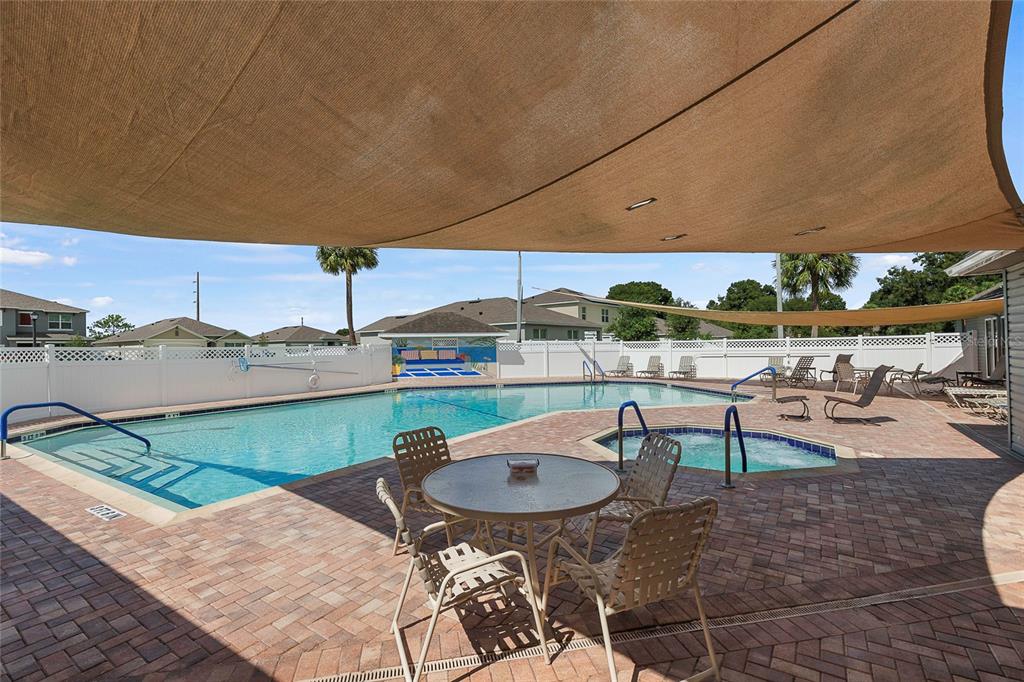 116 Baytree Boulevard Tavares, FL 32778 - Photo 36 of 47 a view of a swimming pool with chairs