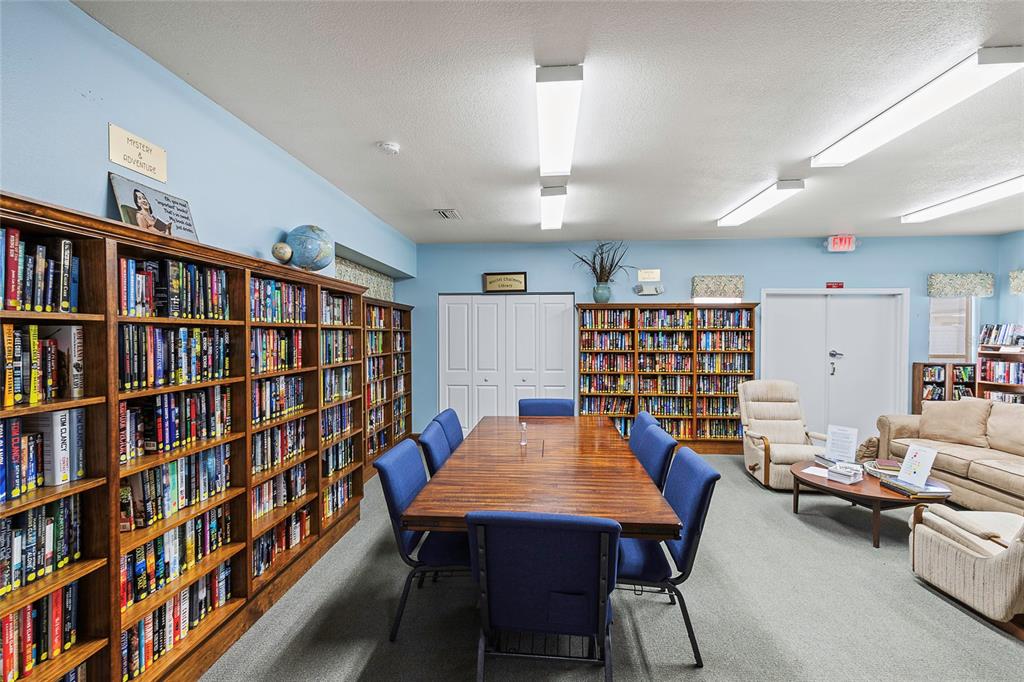 116 Baytree Boulevard Tavares, FL 32778 - Photo 44 of 47 a view of a workspace with furniture and toys