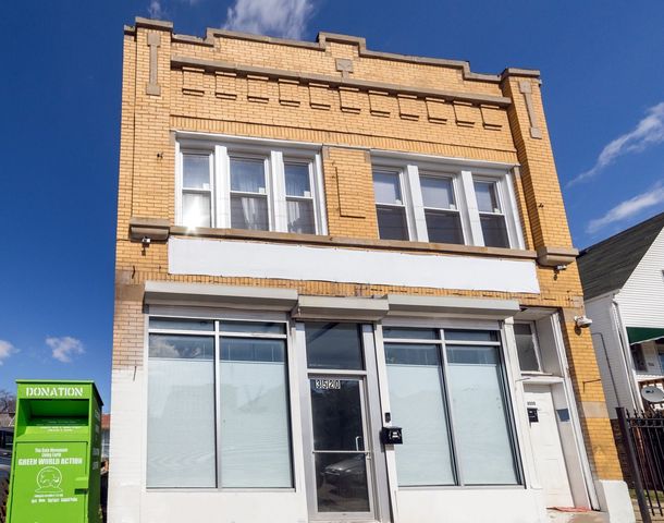 a building with a window and balcony