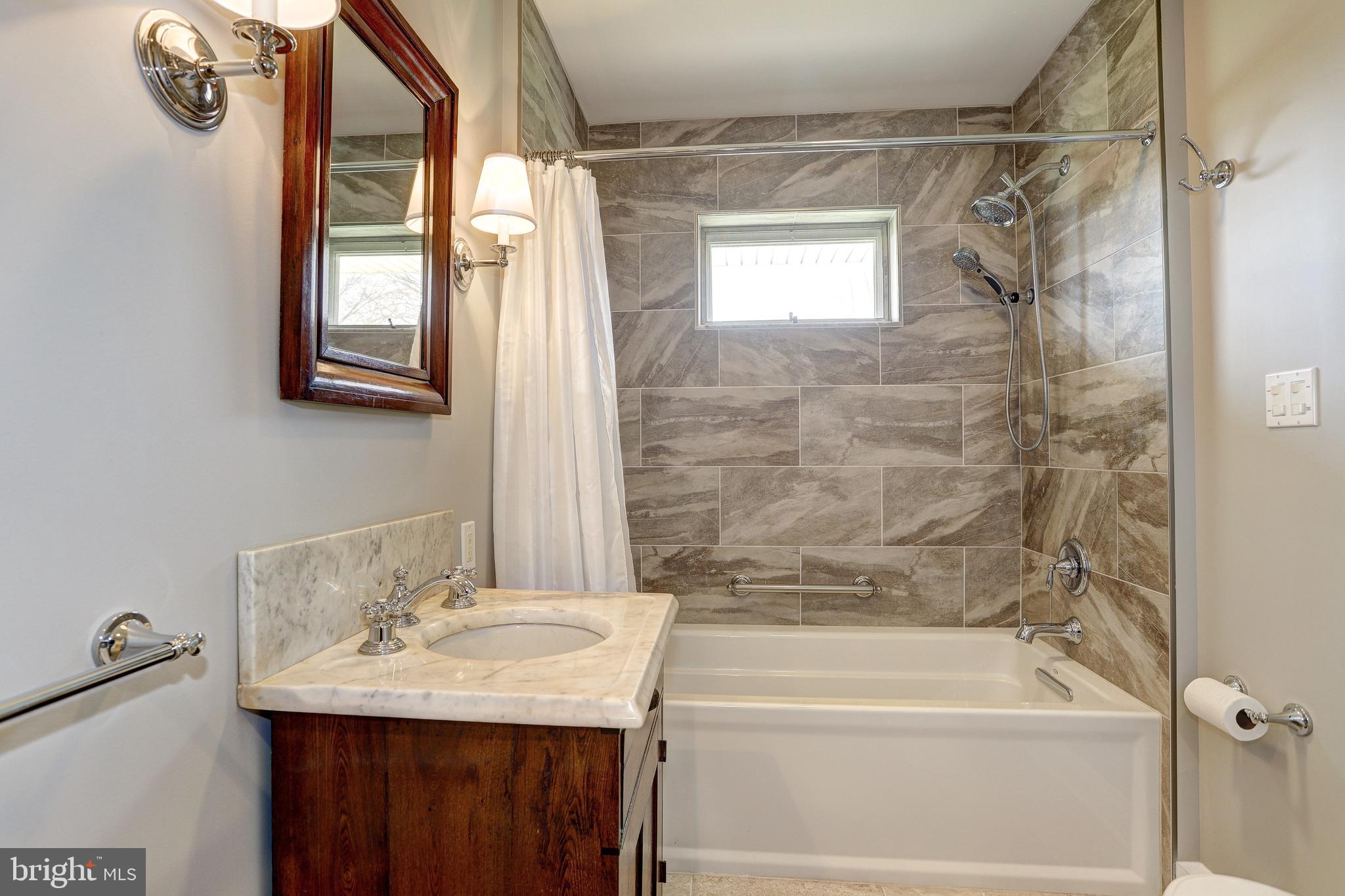 4606 Langshire Road Baldwin, MD 21013 - Photo 18 of 34 2nd Bath w/ oversize tub and beautiful tile work.
