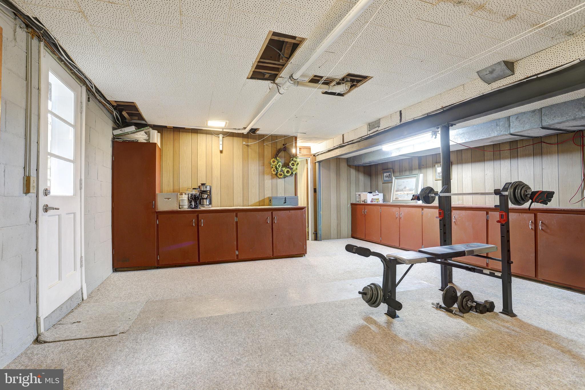4606 Langshire Road Baldwin, MD 21013 - Photo 25 of 34 Large Utility Room / Workshop w/ built-ins..