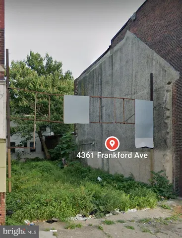 a view of a sign board with a park