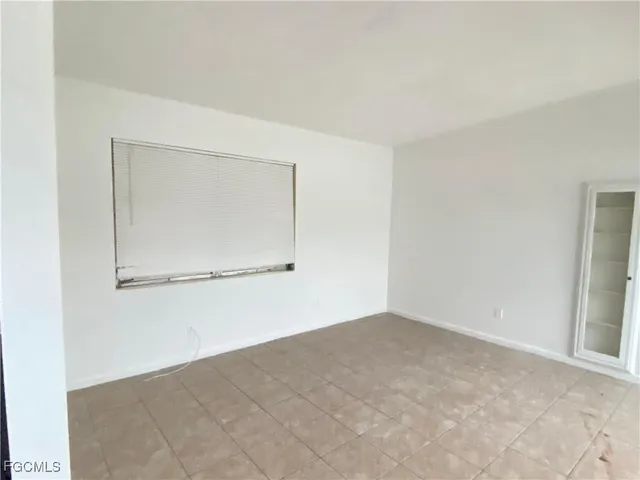 a bathroom with a toilet and a bathtub
