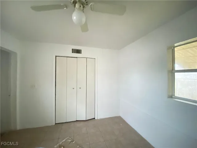 a view of an entryway and livingroom