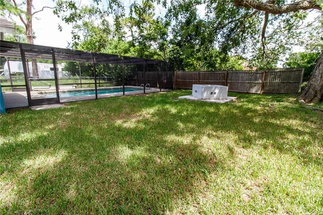 a view of a yard with an outdoor space