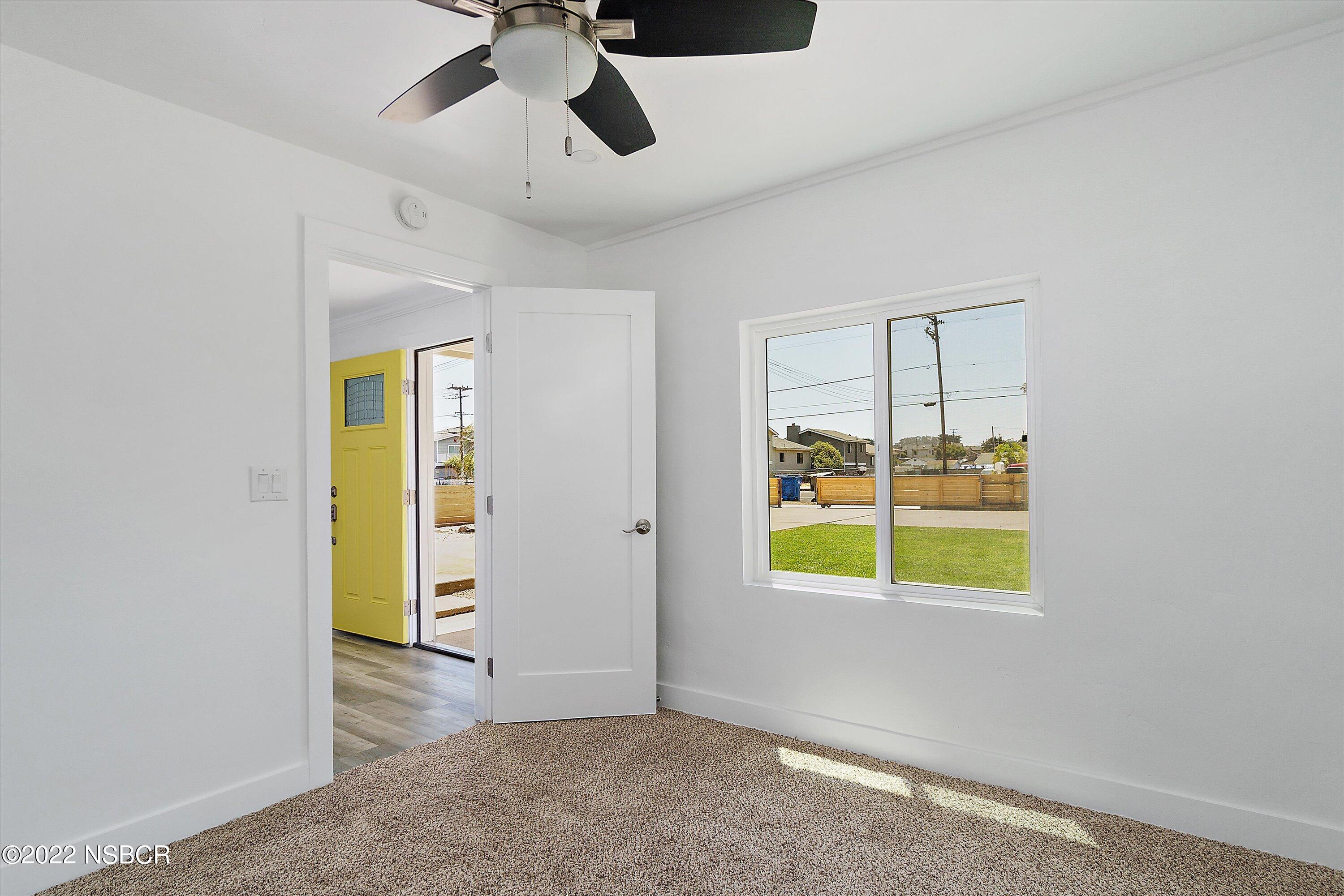 455 Longbranch Avenue Grover Beach, CA 93433 - Photo 14 of 23 a view of an empty room with a window