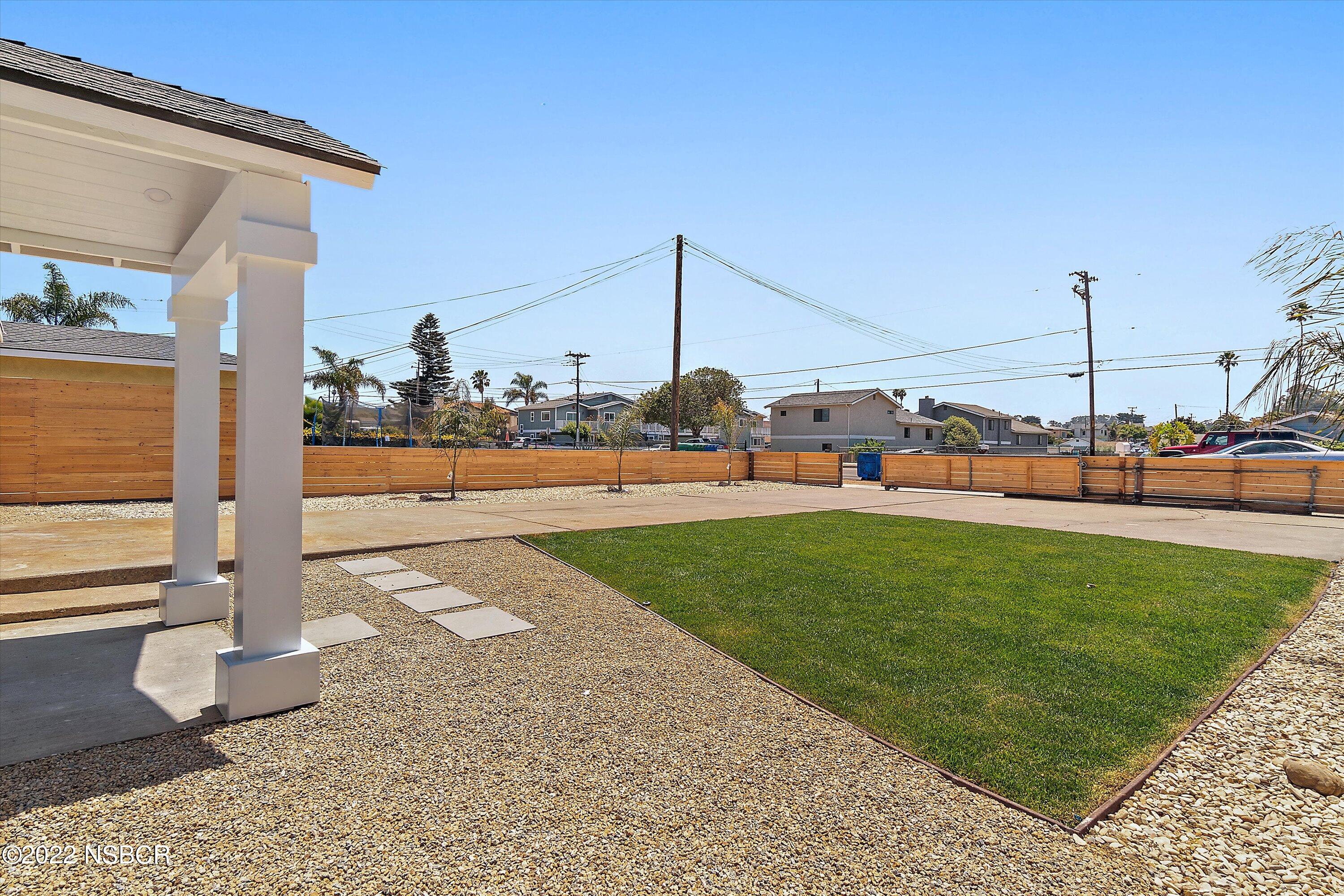 455 Longbranch Avenue Grover Beach, CA 93433 - Photo 6 of 23 a view of a park with large trees