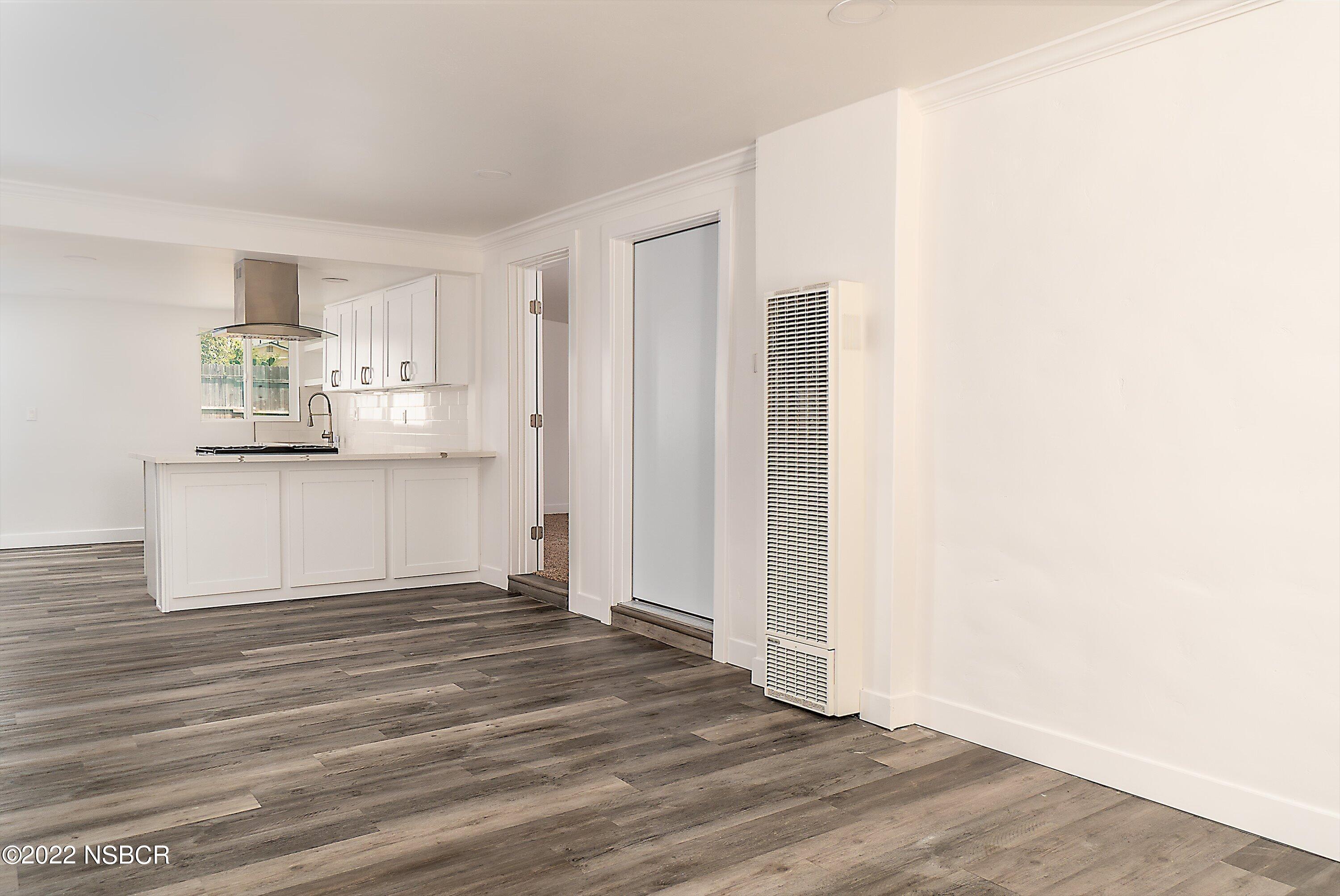 455 Longbranch Avenue Grover Beach, CA 93433 - Photo 10 of 23 a view of kitchen with wooden floor