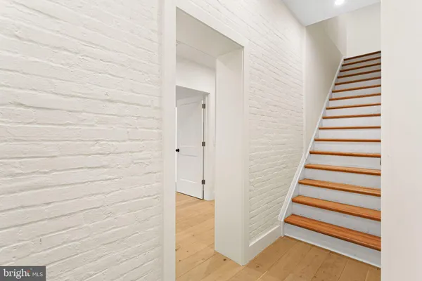a view of a staircase and storage space