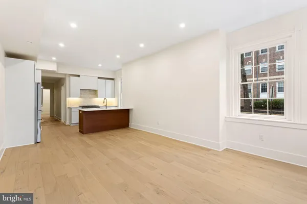 a view of kitchen and windows