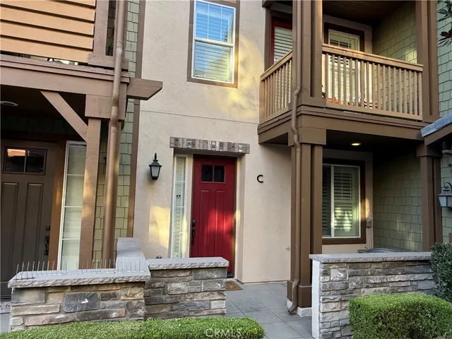a front view of a house with a garage