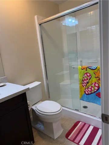 a view of a house with backyard porch and sitting area