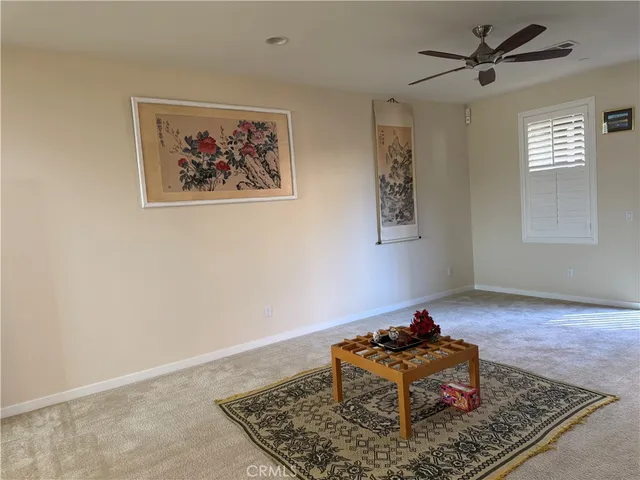 a view of a balcony with stairs and a potted plant