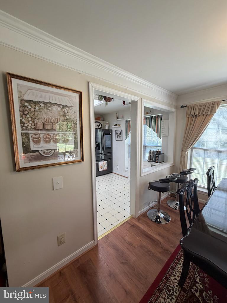46891 Eaton Terrace, Unit 101 Sterling, VA 20164 - Photo 11 of 41 a view of a livingroom with furniture and window