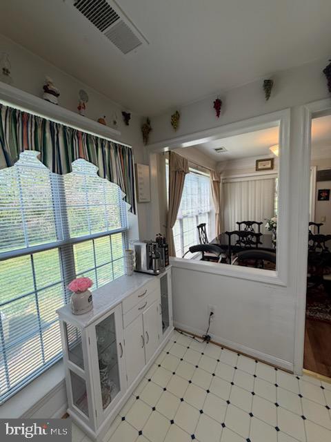 46891 Eaton Terrace, Unit 101 Sterling, VA 20164 - Photo 18 of 41 a living room with furniture and a flat screen tv