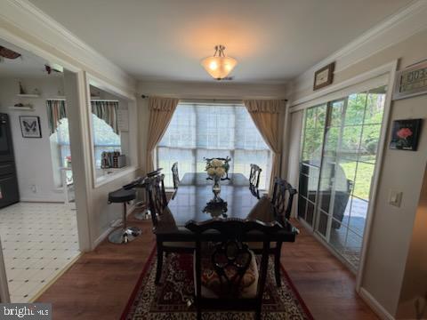46891 Eaton Terrace, Unit 101 Sterling, VA 20164 - Photo 25 of 41 a view of a dining room with furniture and window