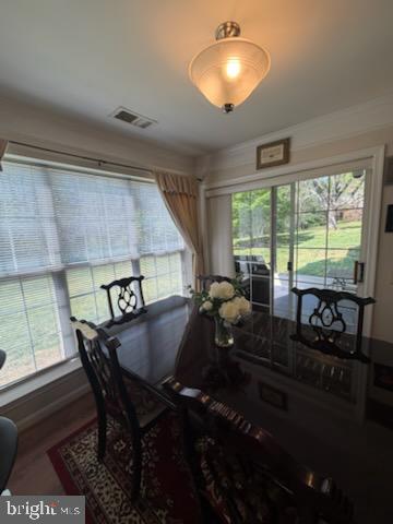 46891 Eaton Terrace, Unit 101 Sterling, VA 20164 - Photo 31 of 41 a view of a dining room with furniture window and outside view