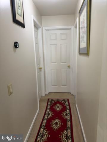 46891 Eaton Terrace, Unit 101 Sterling, VA 20164 - Photo 34 of 41 a bathroom with a sink and a shower