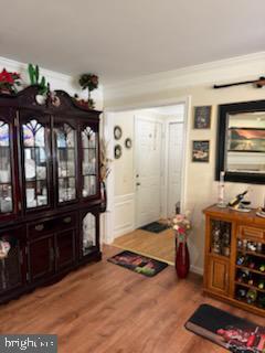 46891 Eaton Terrace, Unit 101 Sterling, VA 20164 - Photo 40 of 41 a bedroom with furniture and flat screen tv