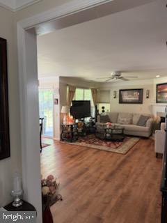46891 Eaton Terrace, Unit 101 Sterling, VA 20164 - Photo 41 of 41 a living room with furniture and a flat screen tv