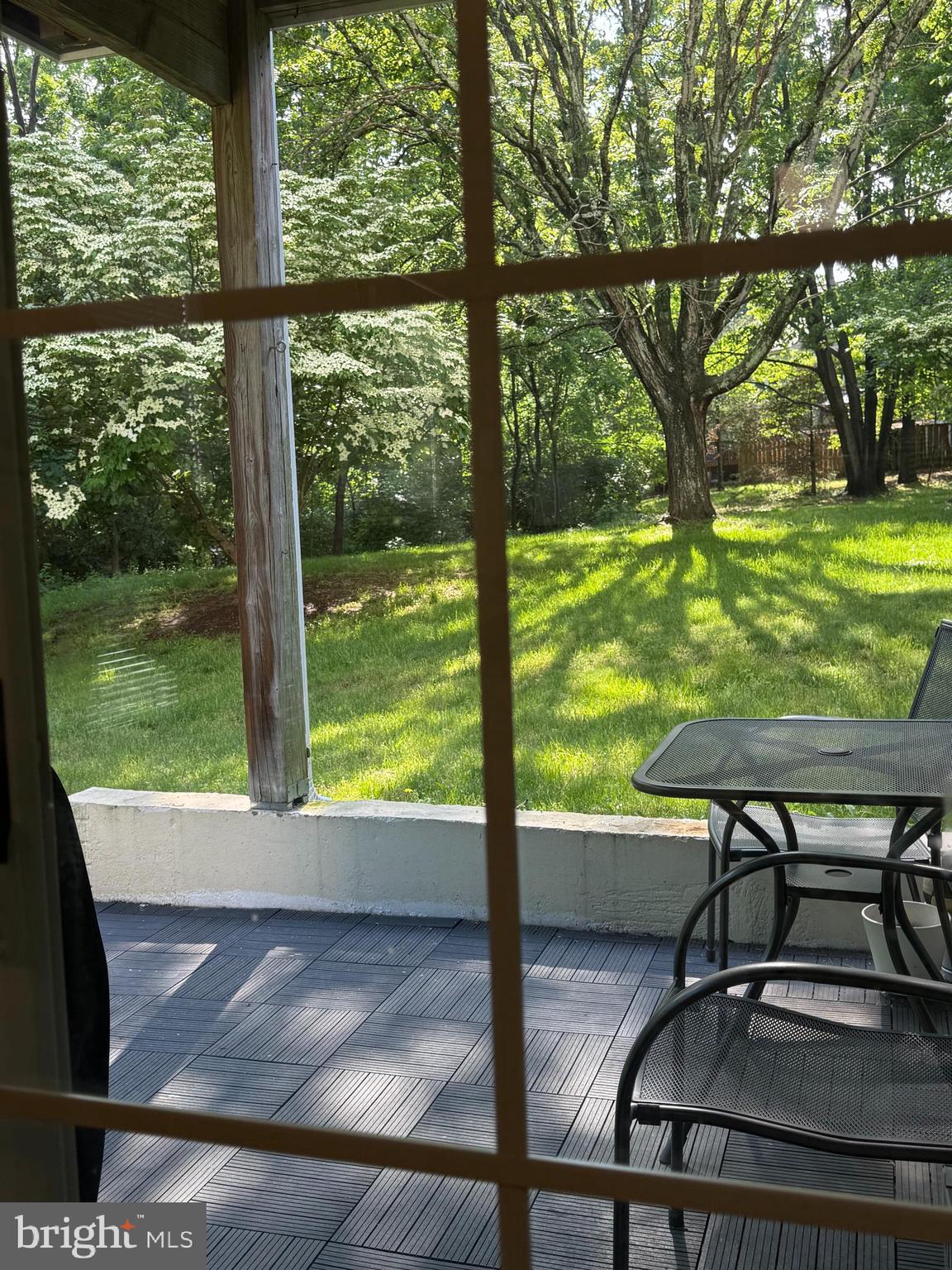 46891 Eaton Terrace, Unit 101 Sterling, VA 20164 - Photo 6 of 41 a view of a two chairs in the patio