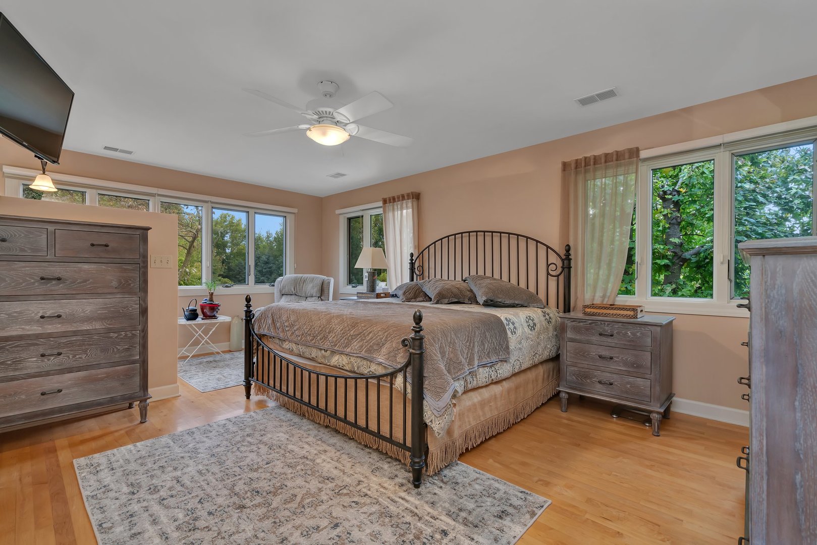 727 South Raven Road Shorewood, IL 60404 - Photo 15 of 36 a bedroom with a bed and large windows