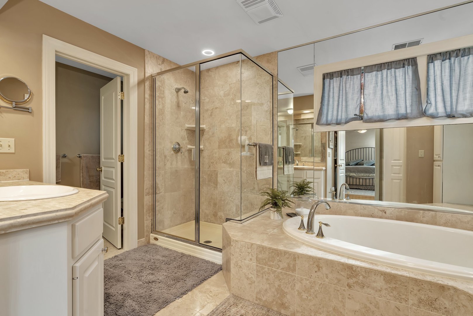 727 South Raven Road Shorewood, IL 60404 - Photo 17 of 36 a bathroom with a granite countertop sink a toilet and shower