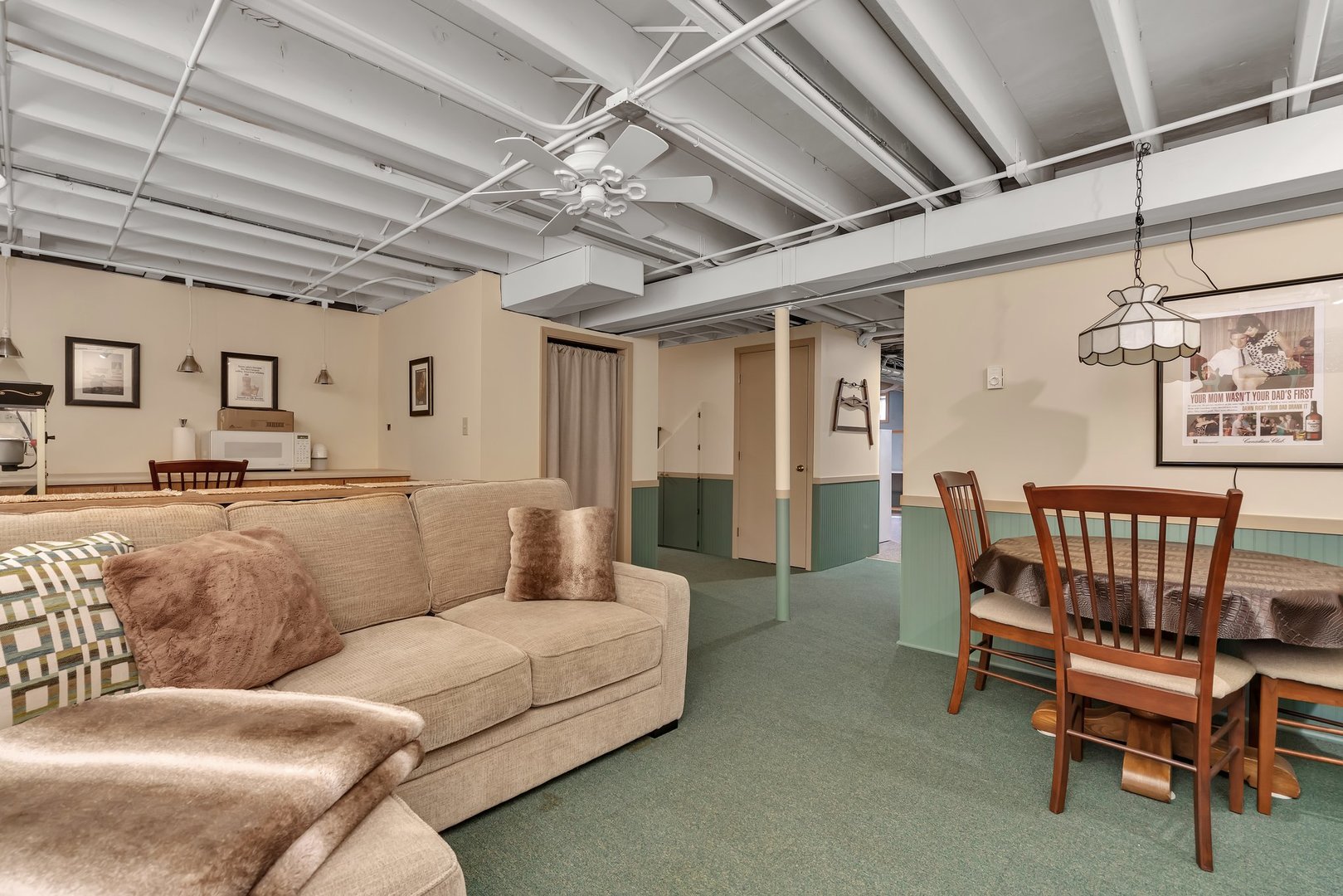 727 South Raven Road Shorewood, IL 60404 - Photo 27 of 36 a living room with furniture and a chandelier