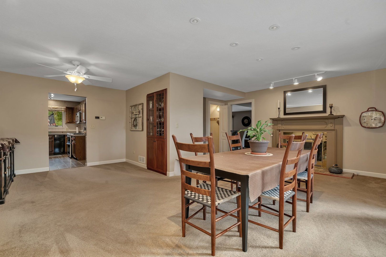 727 South Raven Road Shorewood, IL 60404 - Photo 8 of 36 a view of a dining room with furniture and a kitchen