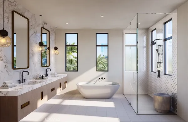 a spacious bathroom with a double vanity sink mirror and double