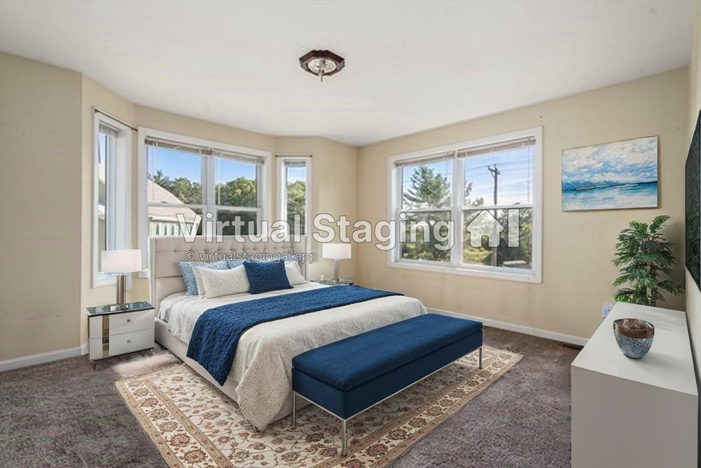 190 Old Road Dracut, MA 01826 - Photo 14 of 36 a bedroom with a bed and a window