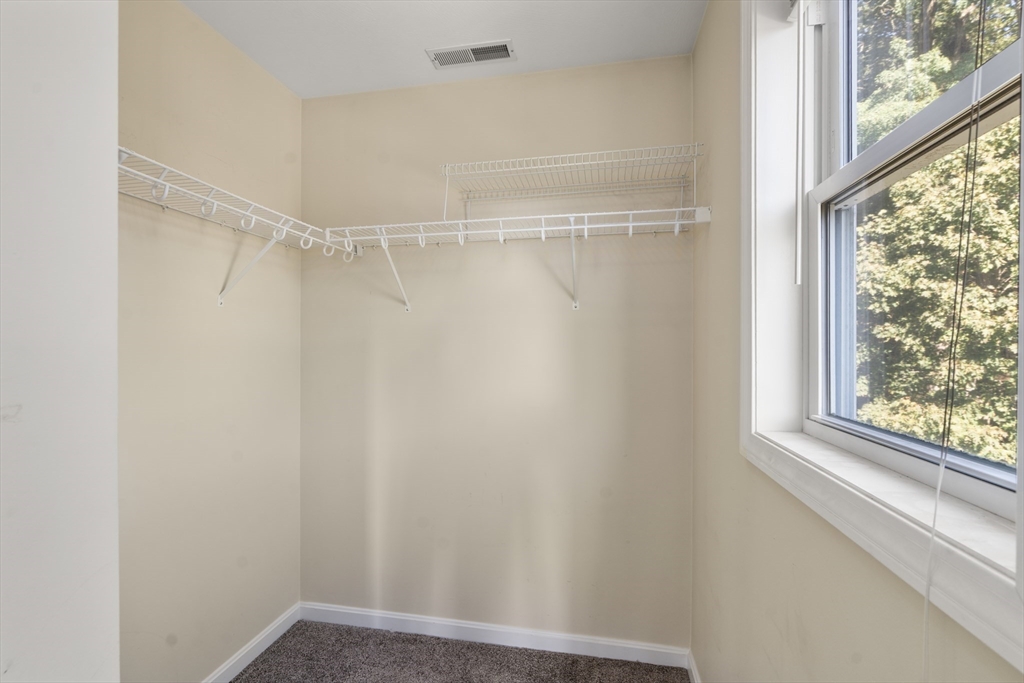 190 Old Road Dracut, MA 01826 - Photo 17 of 36 a view of a room with window and wooden door