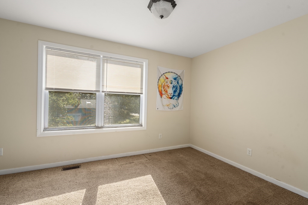 190 Old Road Dracut, MA 01826 - Photo 19 of 36 an empty room with windows