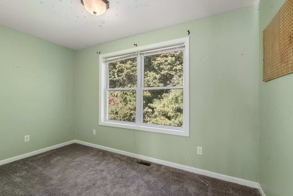 190 Old Road Dracut, MA 01826 - Photo 20 of 36 an empty room with a window