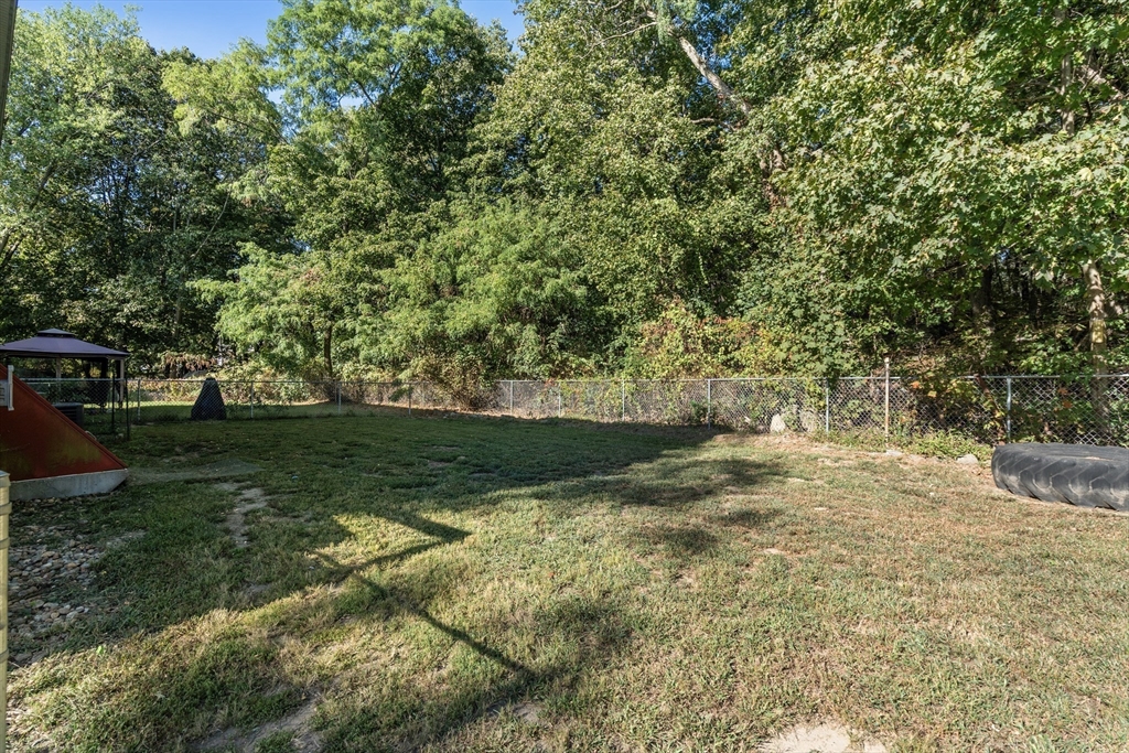 190 Old Road Dracut, MA 01826 - Photo 23 of 36 a view of yard with green space