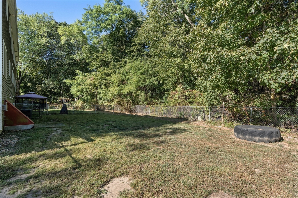 190 Old Road Dracut, MA 01826 - Photo 26 of 36 a view of a yard with trees